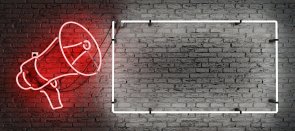 red neon megaphone and empty frame with space for text
